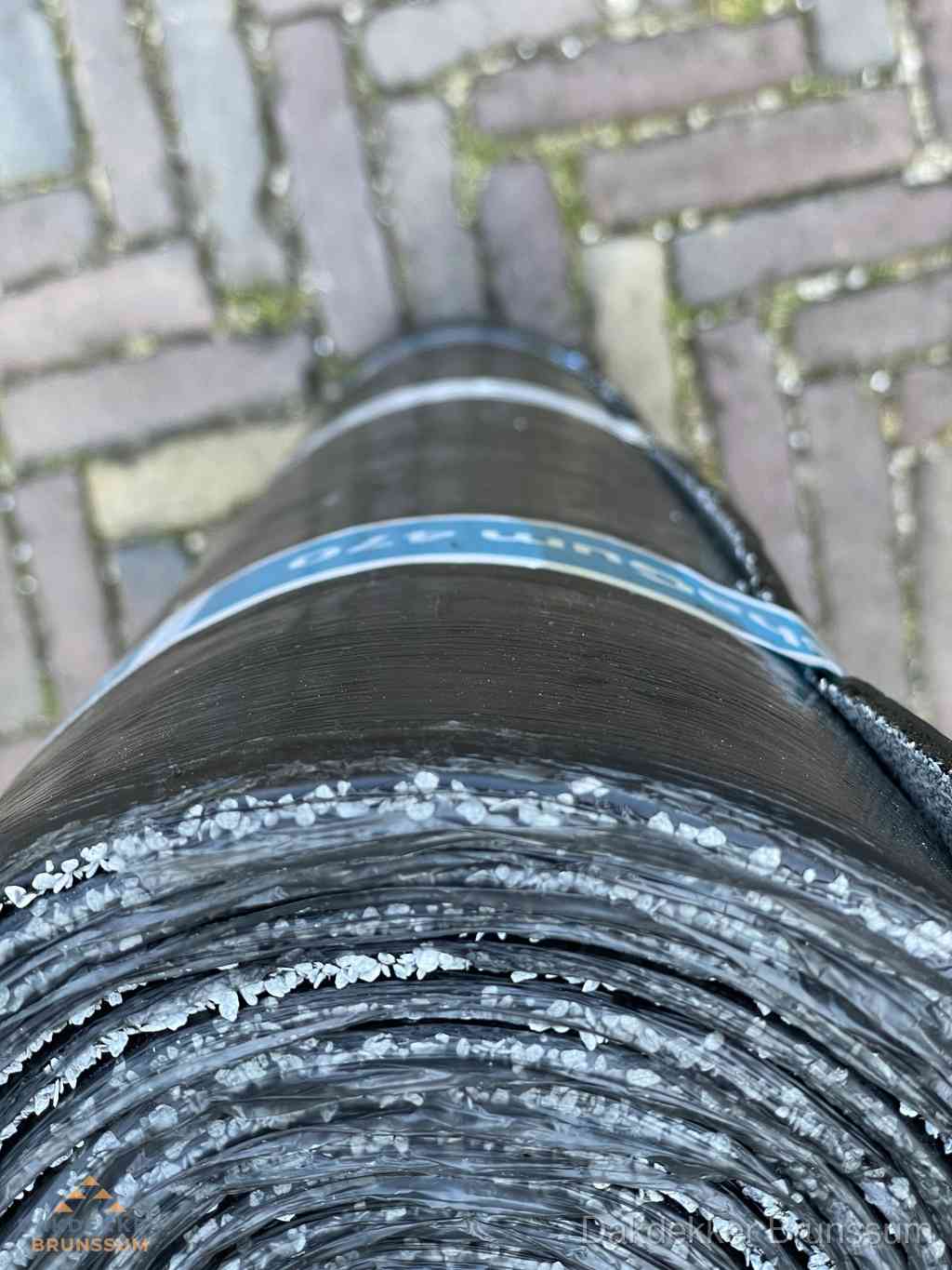 Rol bitumen dakleer met leislag voor plat dak in Brunssum